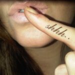 Celeste Rivas has a tattoo of her right index finger that says "Shhh."